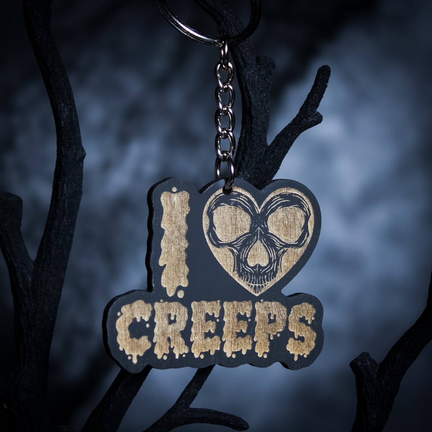 Keychain engraved with "I heart creeps".