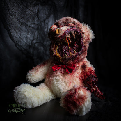 Creepy teddy bear with sharp teeth and gore details.