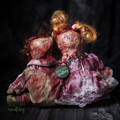 Backside view of conjoined horror doll.