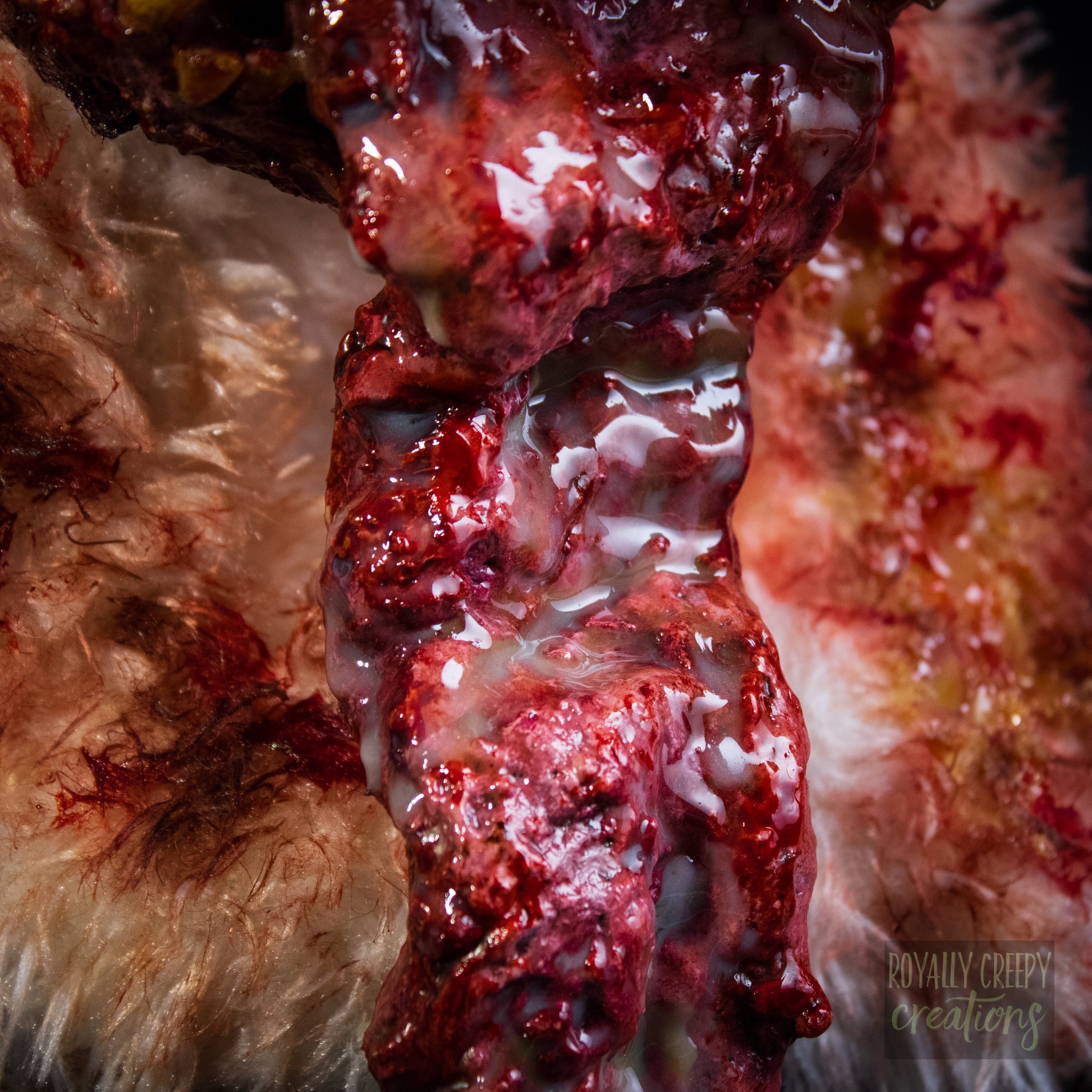 a close-up of a oozy bloody long tongue