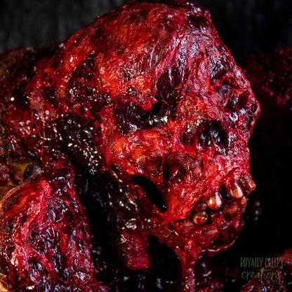 A close-up of a gory bloody skeleton.