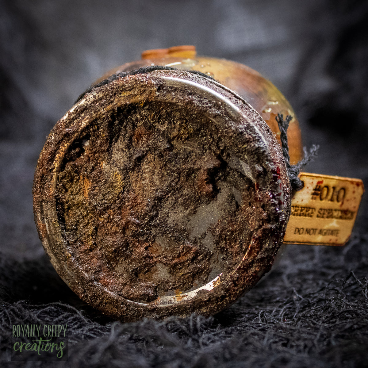 A close-up of a rusty jar lid
